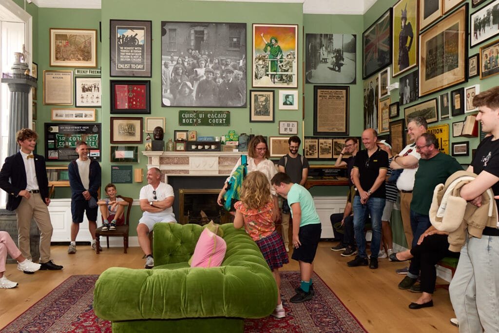 A Little Museum tour guide engaging guests with the history of Dublin in the 1916 Room