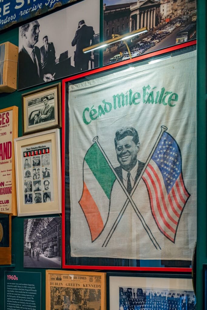 A framed flag wishing JFK a 'Céad Míle Fáilte' on the wall of the Treasury in the Little Museum