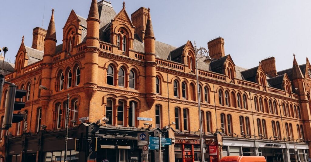 A vibrant red brick building in Dublin city center, showcasing Victorian architecture.