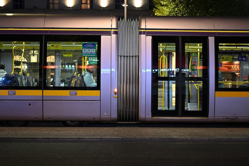 A Luas tram stopped at O'Connell Upper at night, a handy option for getting around Dublin